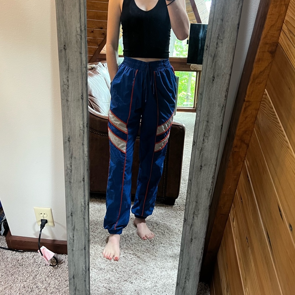 Retro Style Blue Track Pants with Orange Accents